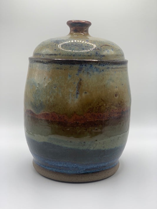Canister with earthy tones